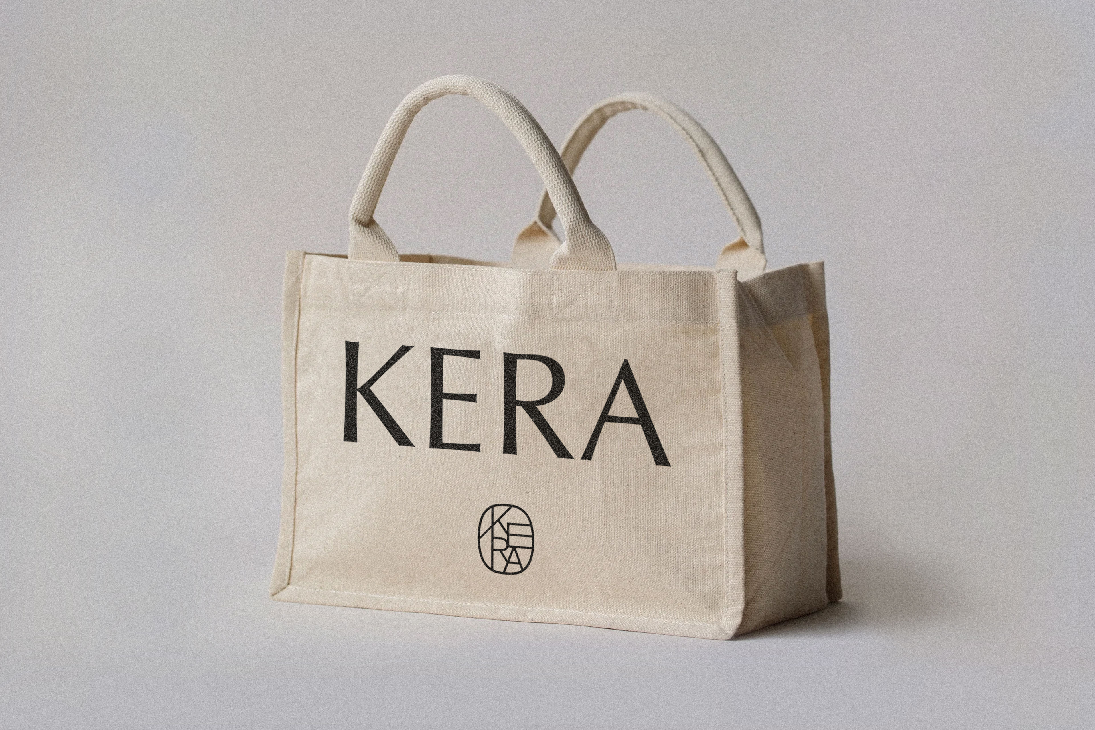A canvas bag with the word kera printed on it.